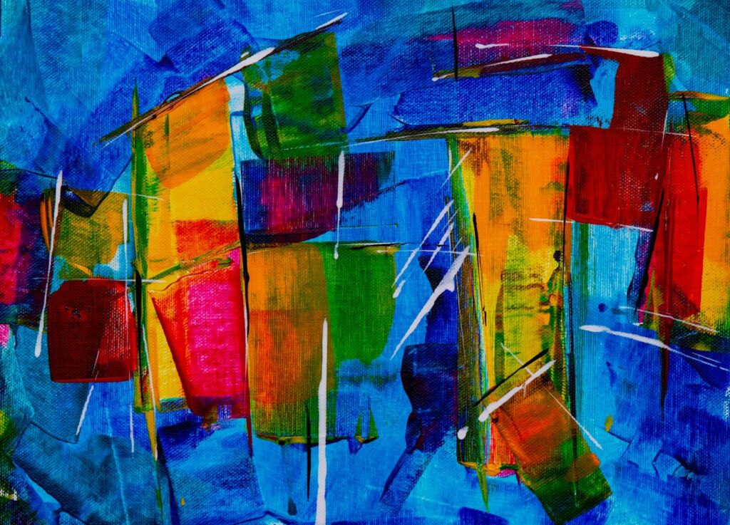 Abstrakte Kunst mit leuchtenden Farben und Formen.